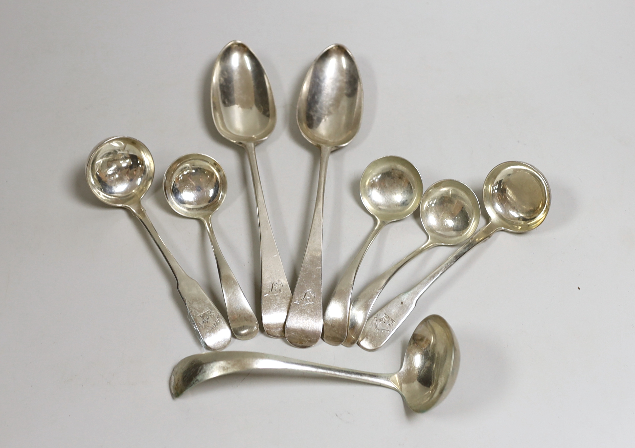 A small selection of Georgian and later silver to include six small ladles, including Dutch white metal and a pair of George III Old English pattern silver table spoons, London, 1788, 10.4oz.